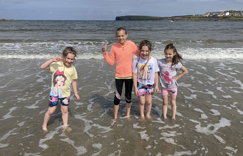 four kids at the beach as part of EDNIP