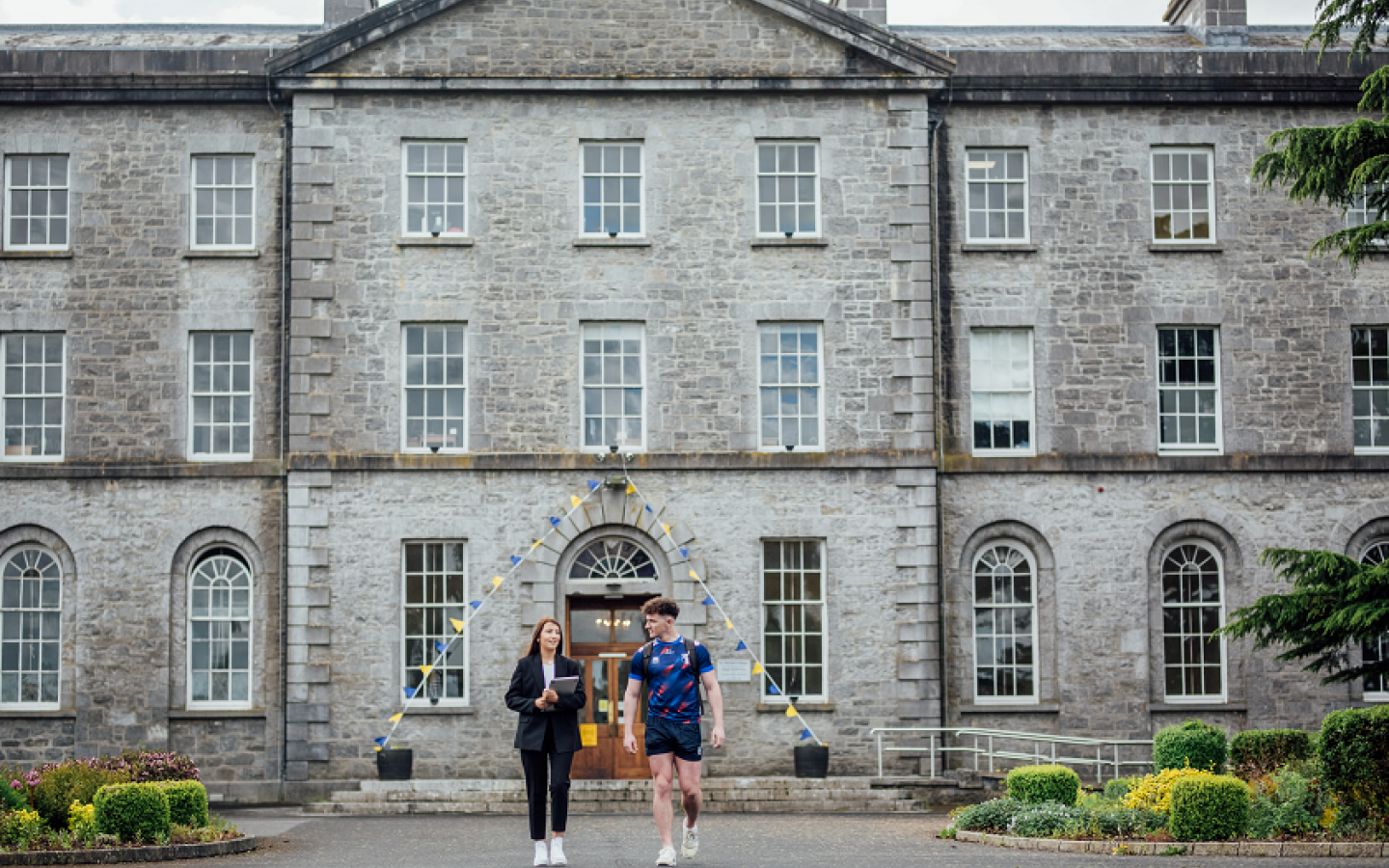 Two students outside the main building MIC Thurles