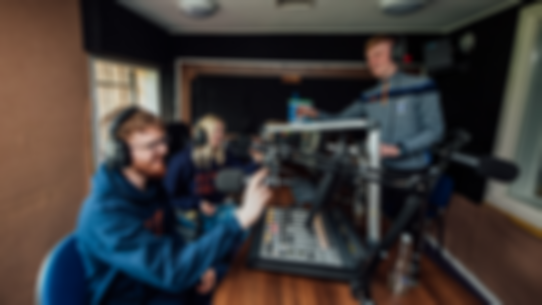 Students presentation a radio show on Wired FM