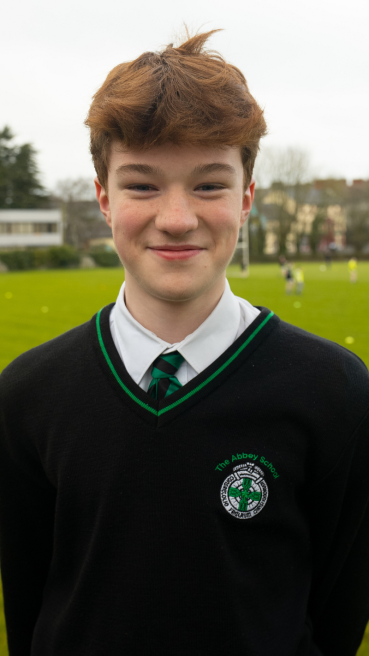 Male secondary school student in school yard as part of male teachers CAO campaign