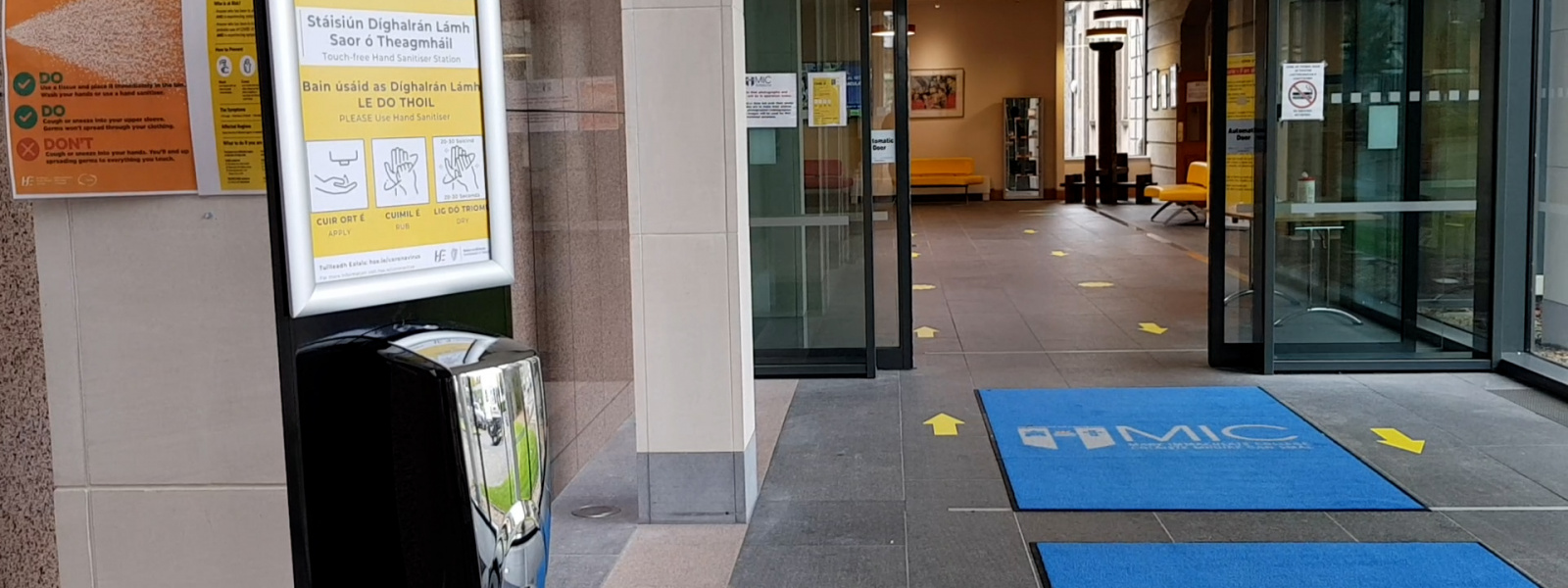 Entrance to MIC Limerick with COVID-19 signs
