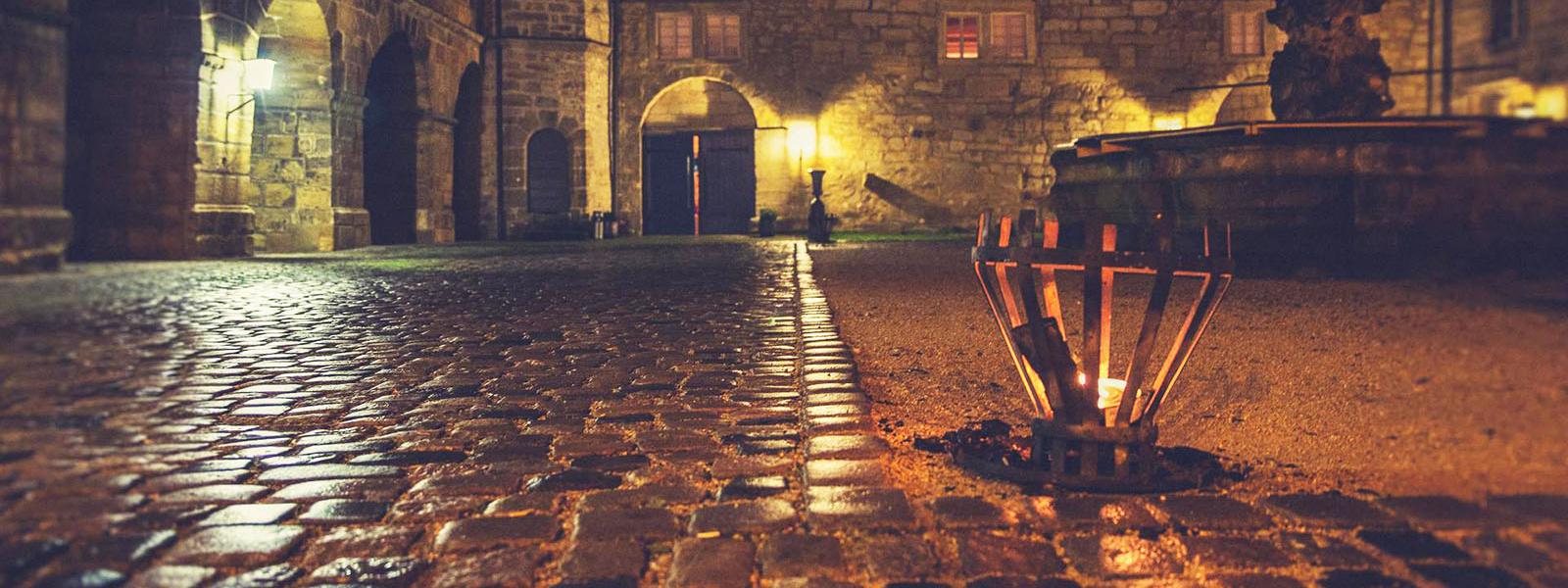Cobbled courtyard at night