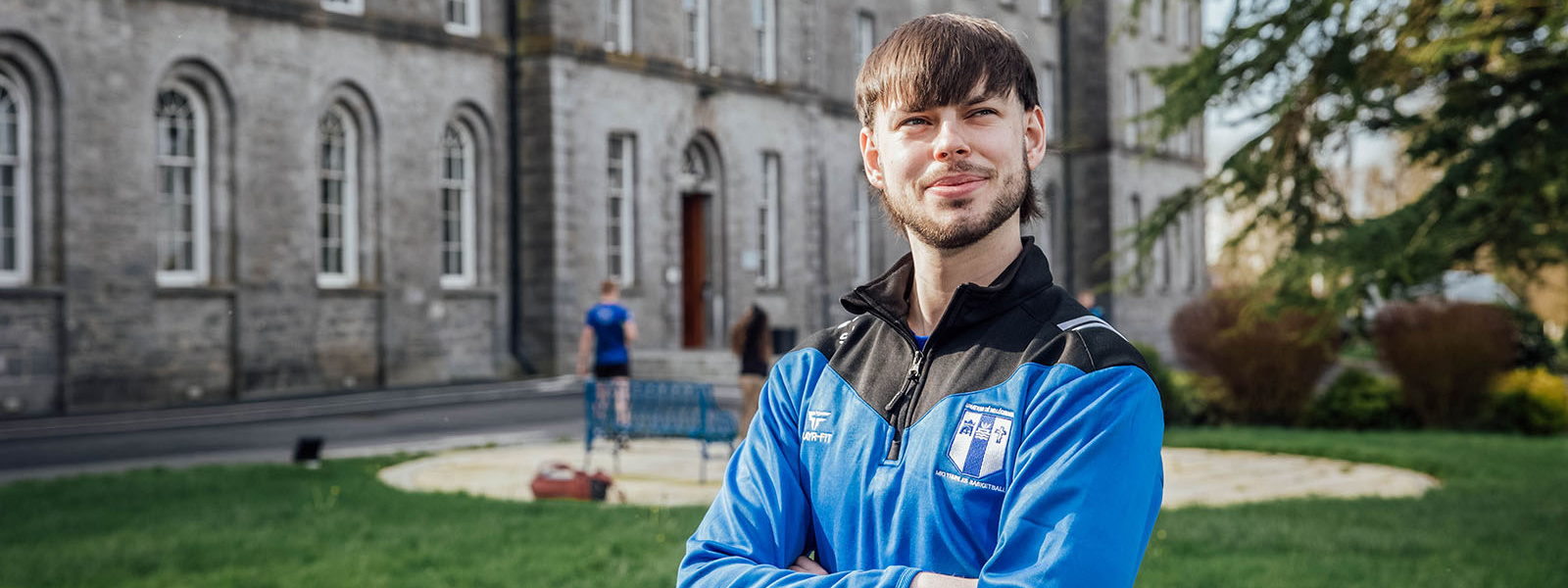 Undergraduate student outside the main building at MIC Thurles.