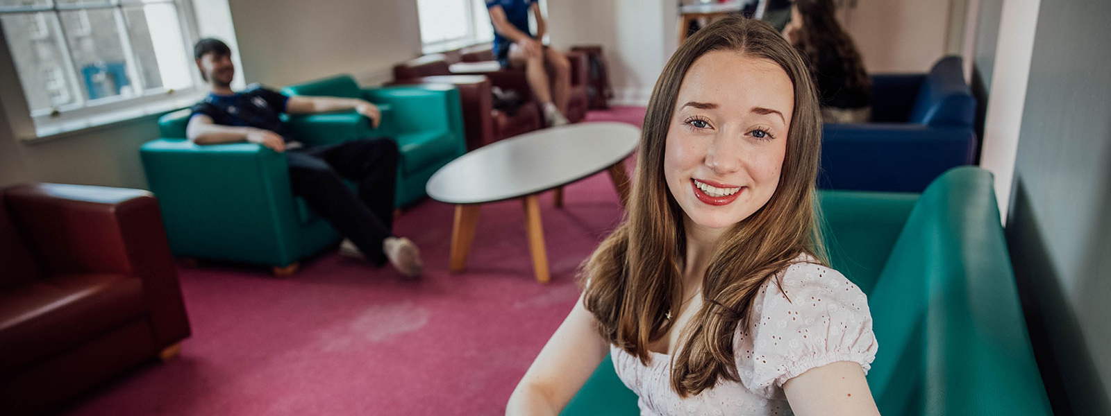 Undergraduate students sitting in the student lounge at MIC Thurles.