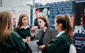 Lilian Monahan from the MIC Admissions Office talking to secondary school students at MIC Open Day