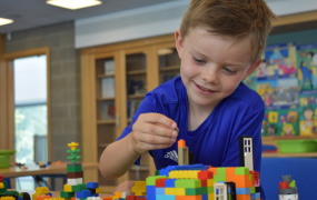 Image of child playing with lego