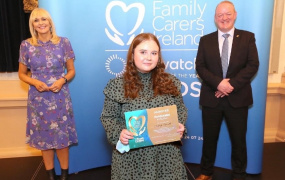 Clodagh holding her award 