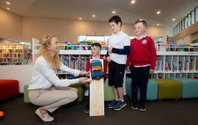 Dr Maeve Liston with three school children at Kilmallock library during the launch of the festival