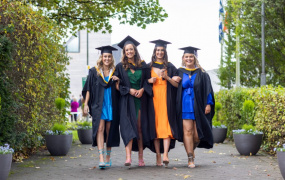 Four girls walking