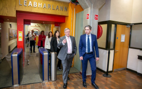 Minister Simon Harris exiting the MIC library building with Professor Eugene Wall.
