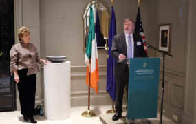 President Eugene Wall speaking beside the Ambassador of Ireland to the USA