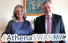 Professor Lorraine McIlrath, Director of Equality, Diversity, Inclusion and Interculturalism (EDII) and Professor Eugene Wall, President of MIC holding a hashtag Athena Swan MIC sign