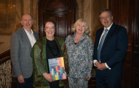 Dr Brighid Golden holds the book with Dr Maurice Harmon, Professor Emer Ring and Professor Eugene Wall