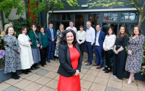 Project Lead, Dr Johanna Fitzgerald stands in front of semi-circle of people at launch