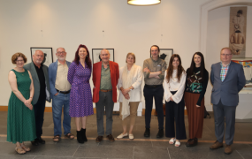 A group of people posing for a picture to celebrate Comhdháil na Bealtaine 2025