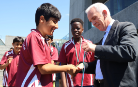 Happy children getting medals for soccer