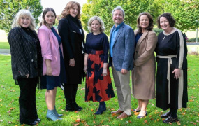 A group of people posing for a photograph for the LINC Conference