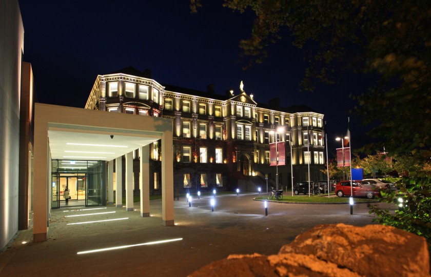 Exterior shot of MIC Foundation Building at night.