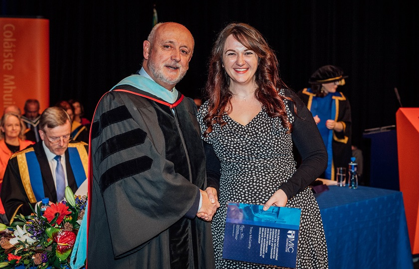 Prof. Jim Deegan presents MIC postgraduate student, Tracy McCarthy, with her 2019 IRC Govt. Award 
