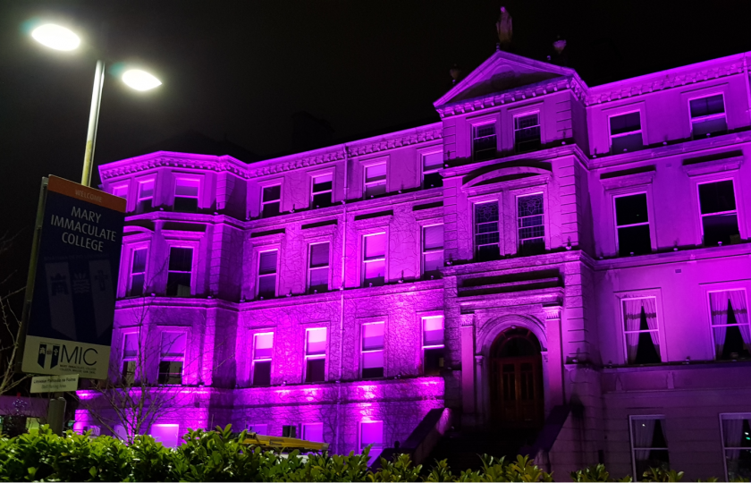 MIC's Foundation Building with purple lighting