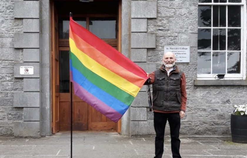 Tony Ó Floinn, MIC Lecturer raises the Pride Flag 