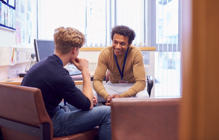 Two men talking