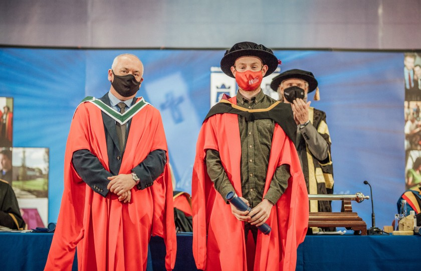 A PhD student and his supervisor pictured at the MIC graduation