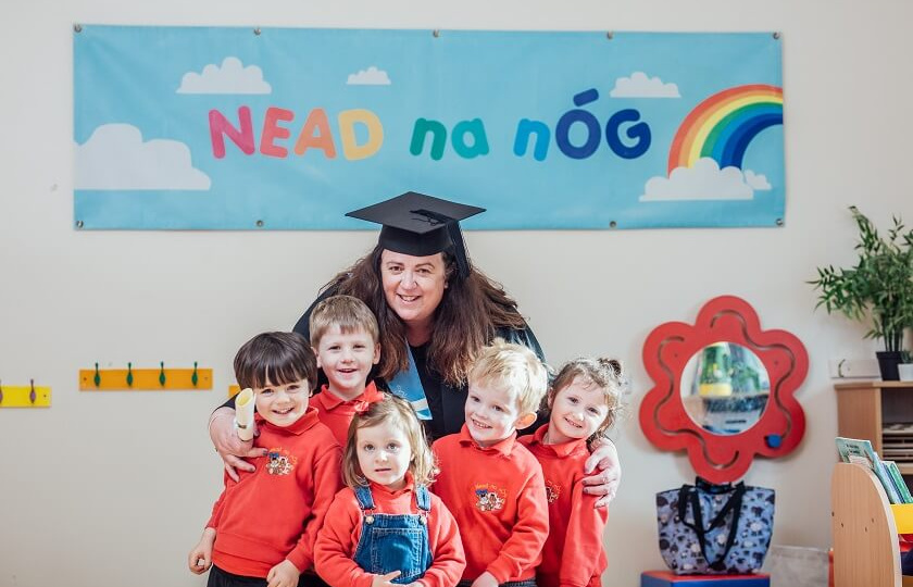 LINC Programme 2021 graduate with children in Nead na nÓg ELC setting