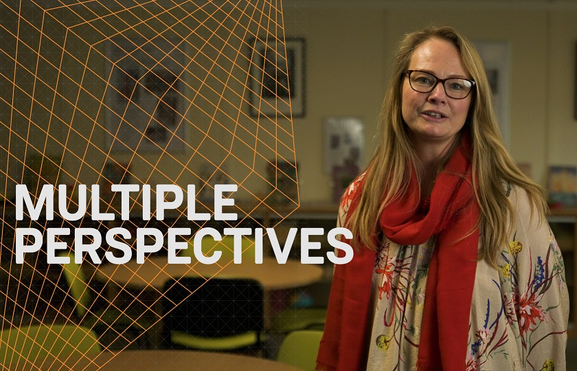Female student on the Graduate Diploma in Adult and Further Education with a graphic saying 'Multiple Perspectives' beside her