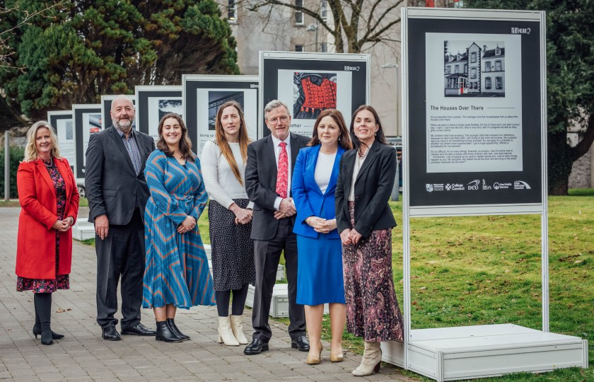 MIC staff gathered at the launch of the exhibition 