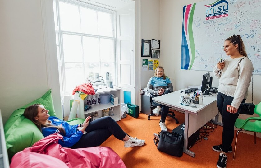 Three female students chatting at the MISU, MIC Thurles