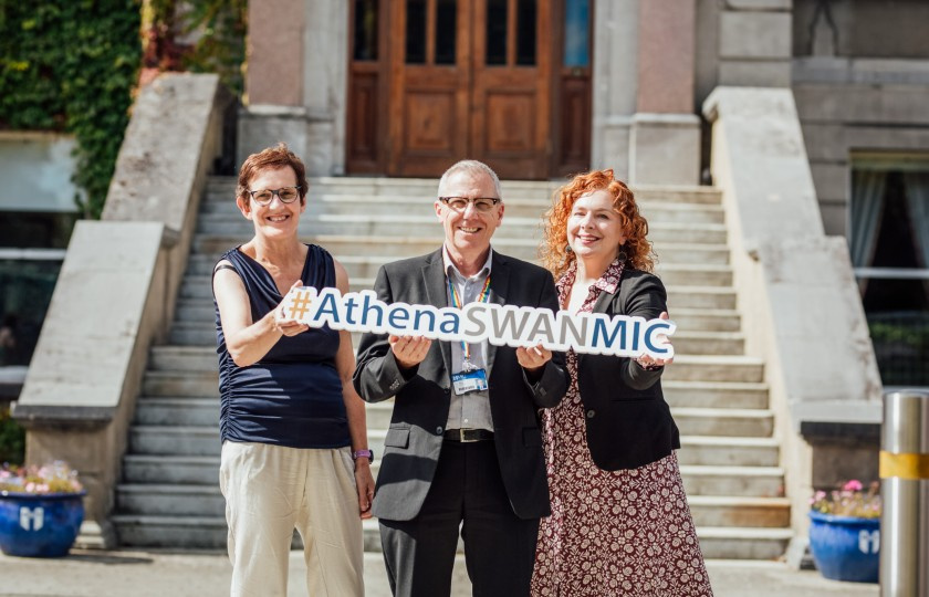 Dr Joan O'Sullivan, Professor Bill Leahy and Dr Deirdre Flynn holding an Athena Swan sign