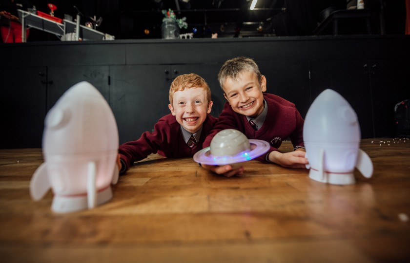 Two male students experimenting with science