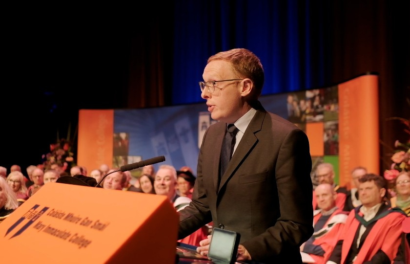 Micheal Lehane speaking at a podium