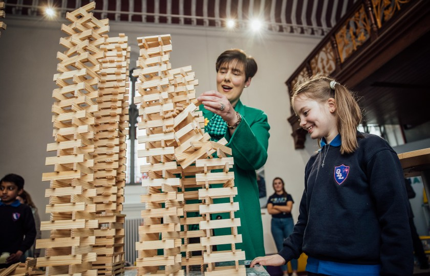 Minister Foley builds blocks with Elizabete Atajeva of Our Lady of Lourdes National School, Limerick