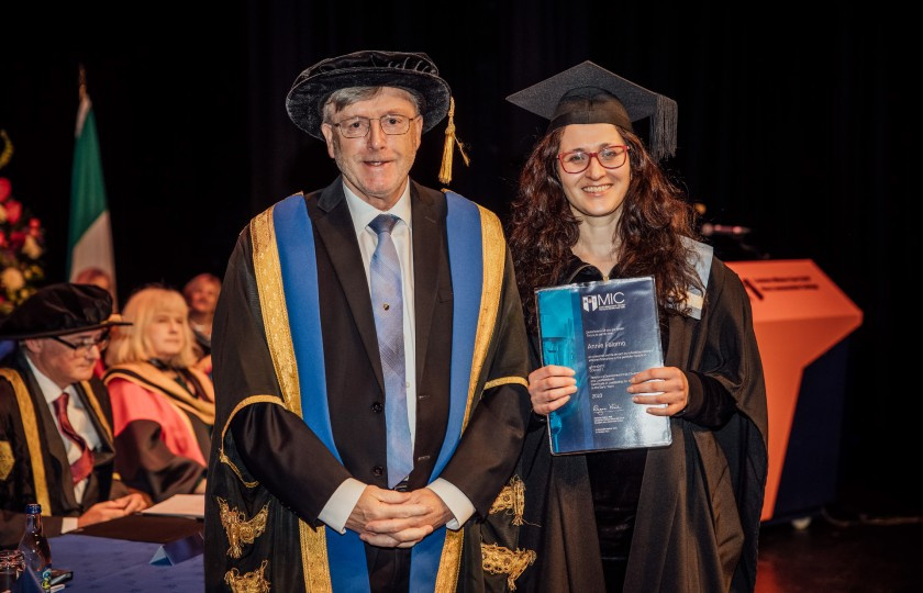 Annie Falamo, awarded Best LINC Portfolio (Cohort 1), with Professor Eugene Wall