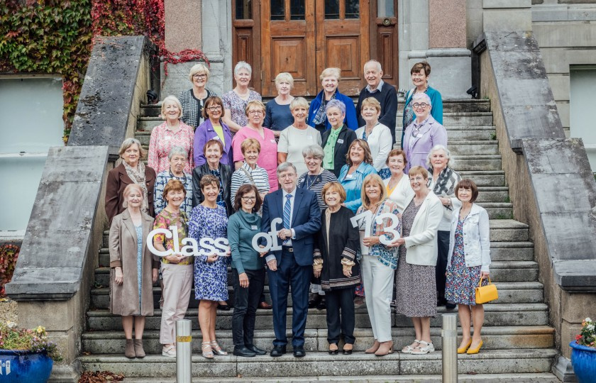 1973 class group pictured on the steps outside MIC Limerick Foundation Building at MIC Alumni Reunion 2023.