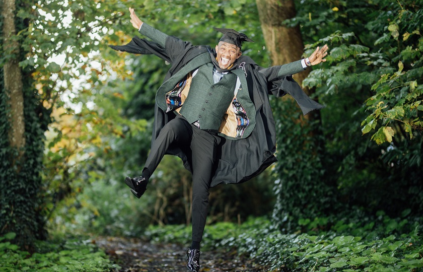 MIC Graduation 2023 David Chisanga, MISU Vice-President, jumping for joy 