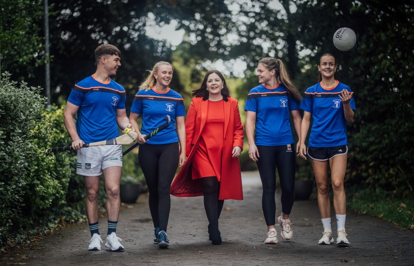 Four of the Elite Scholars walking with Professor Niamh Hourigan