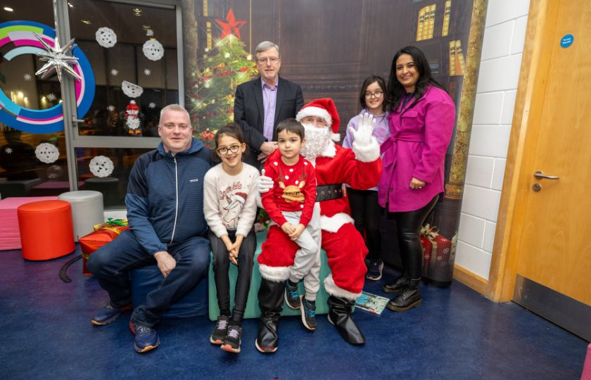 Student Imén Bourke pictured with her family, Santa and President of MIC, Professor Eugene Wall