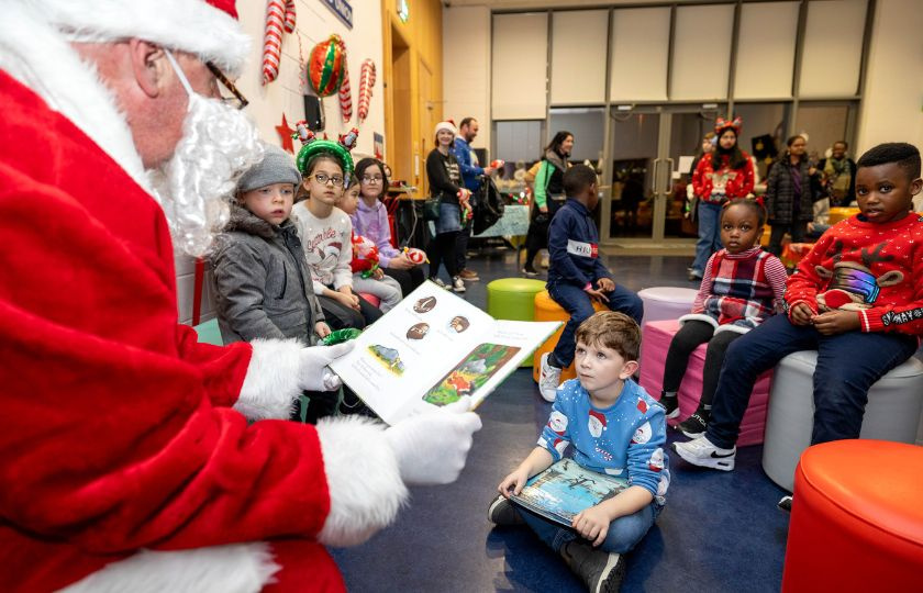 Fergus (6) listening intently to Santa's storytime