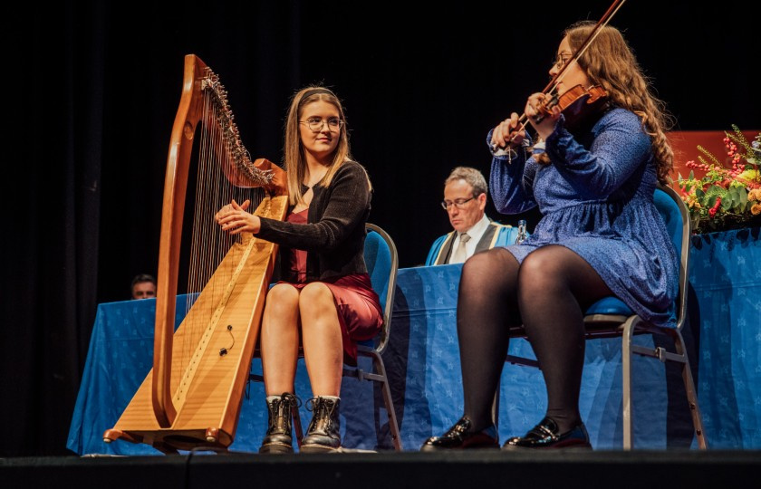 Catherine and Róisín playing on stage