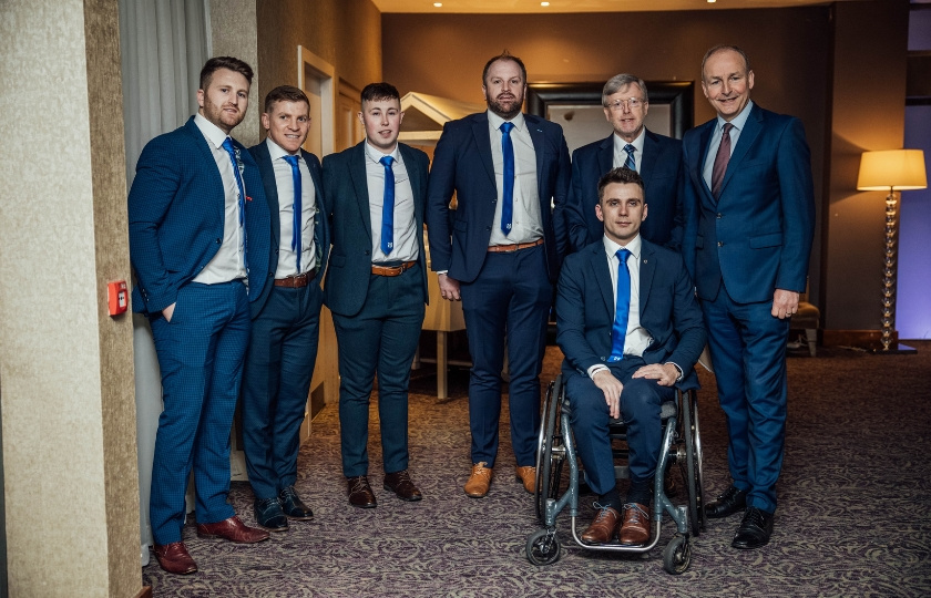 An Tánaiste with Prof Eugene Wall and the MIC Hurling Management Team