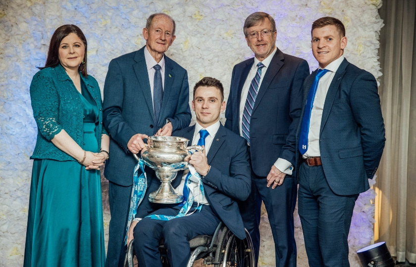 Professor Niamh Hourigan, Éamonn Cregan, Professor Eugene Wall and Podge Collins with Jamie Wall holding Fitzgibbon Cup