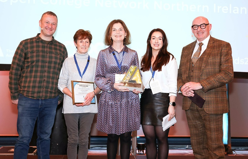 Comedian PJ Gallagher, MC of the AONTAS STAR Awards; Kitty Noonan, EAL volunteer with the EDNIP English Conversation Club; Lisa Martin, EDNIP Project Leader; Niamh McGoldrick, Open College Network Northern Ireland (OCN NI) and AONTAS Chair, John D’Arcy.