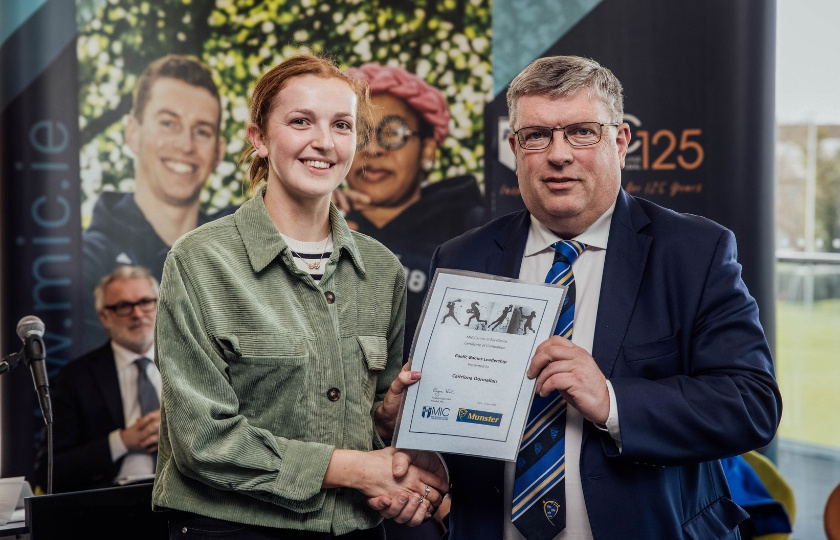 Caitriona Donnellan and Ger Ryan holding a certificate