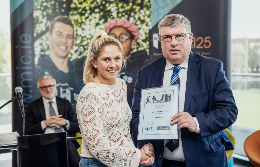 Farah Forde and Ger Ryan holding a certificate