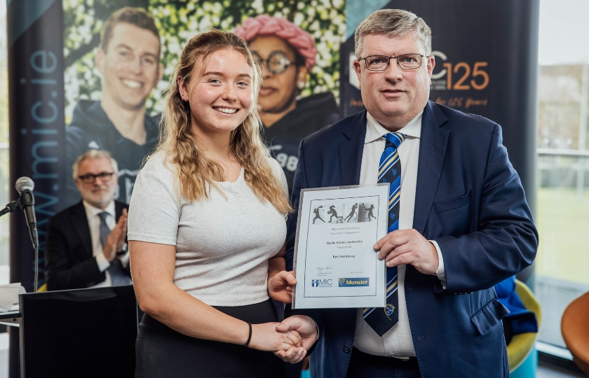 Keri Hennessy and Ger Ryan holding a certificate