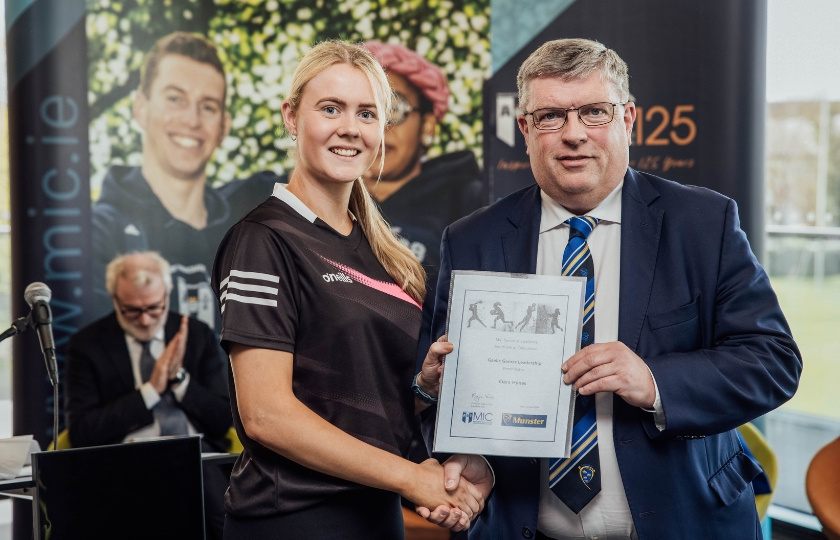 Ciara Hynes and Ger Ryan holding a certificate