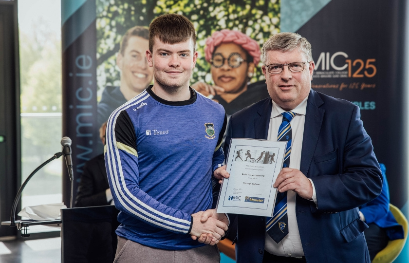 Darragh Spillane and Ger Ryan holding a certificate